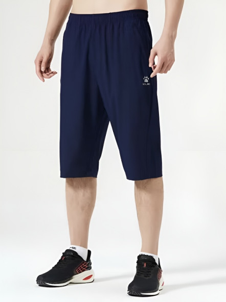 Бриджи KELME Men's Woven Cropped Pants Dark Blue